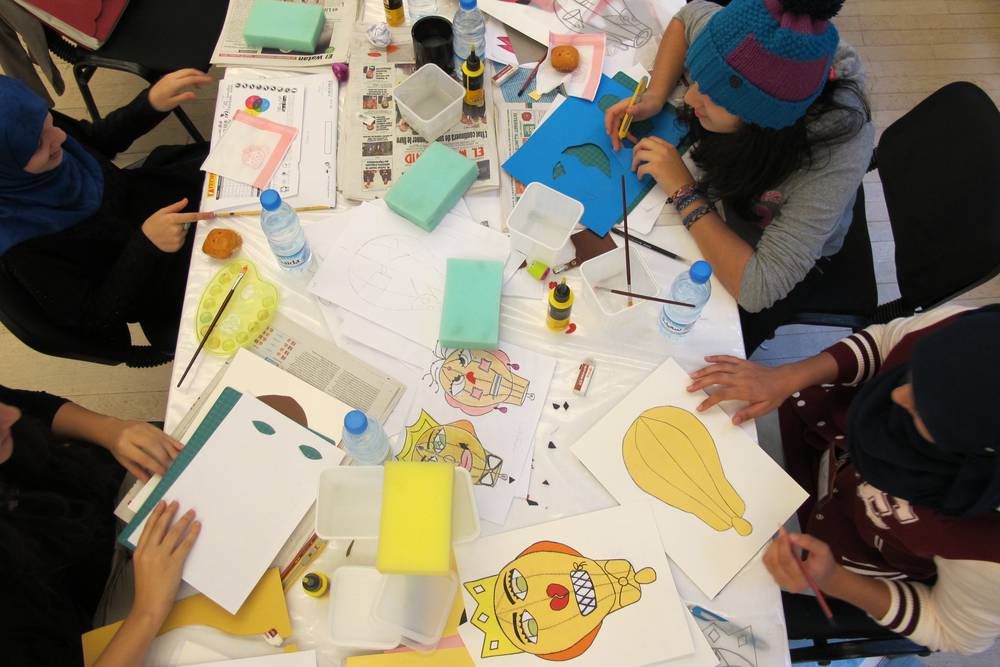 Participating teachers and learners working on punchbag designs as part of artist workshop, 10 November – 2 December 2013.